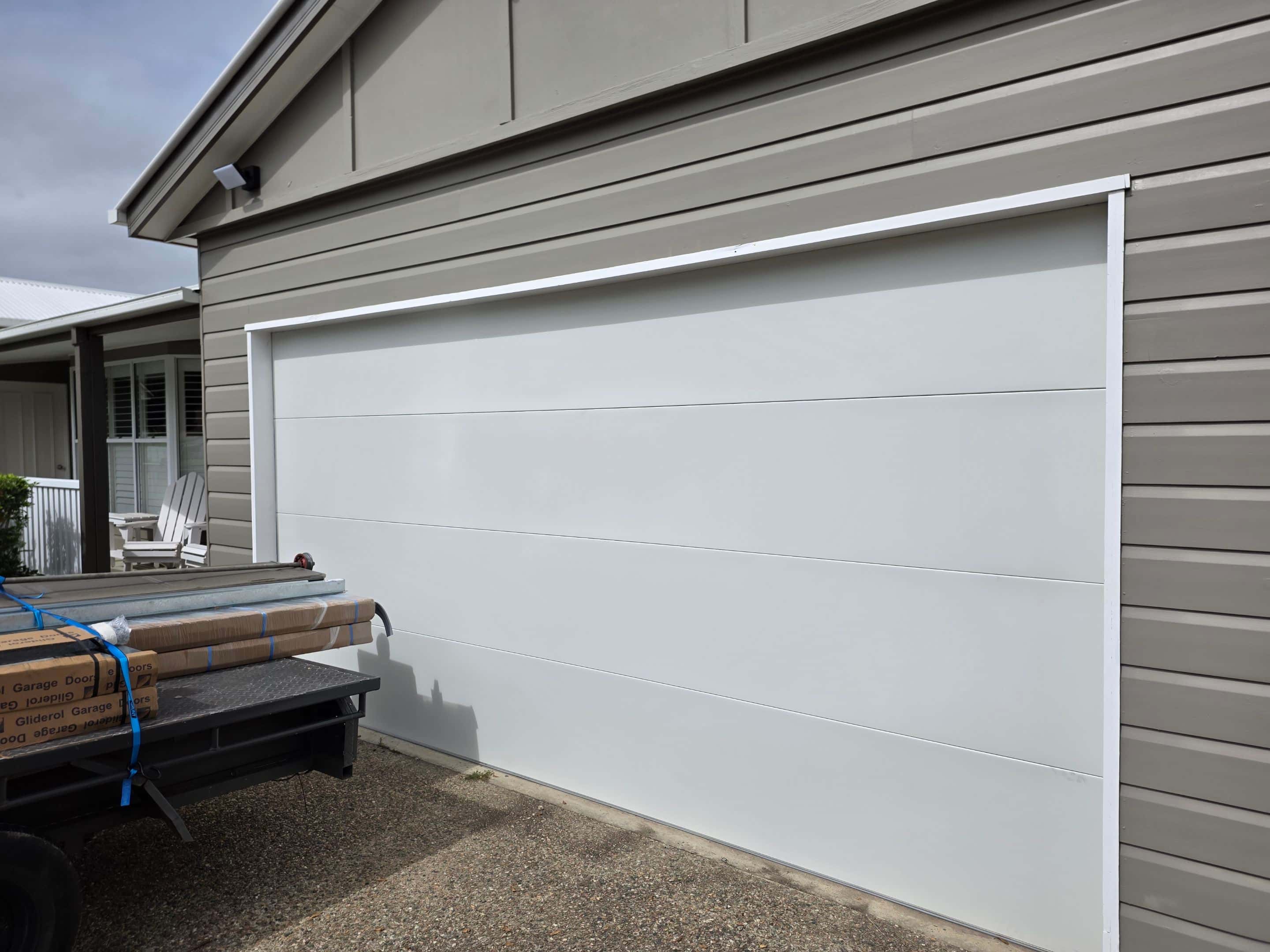 New garage door installation in progress on the Sunshine Coast