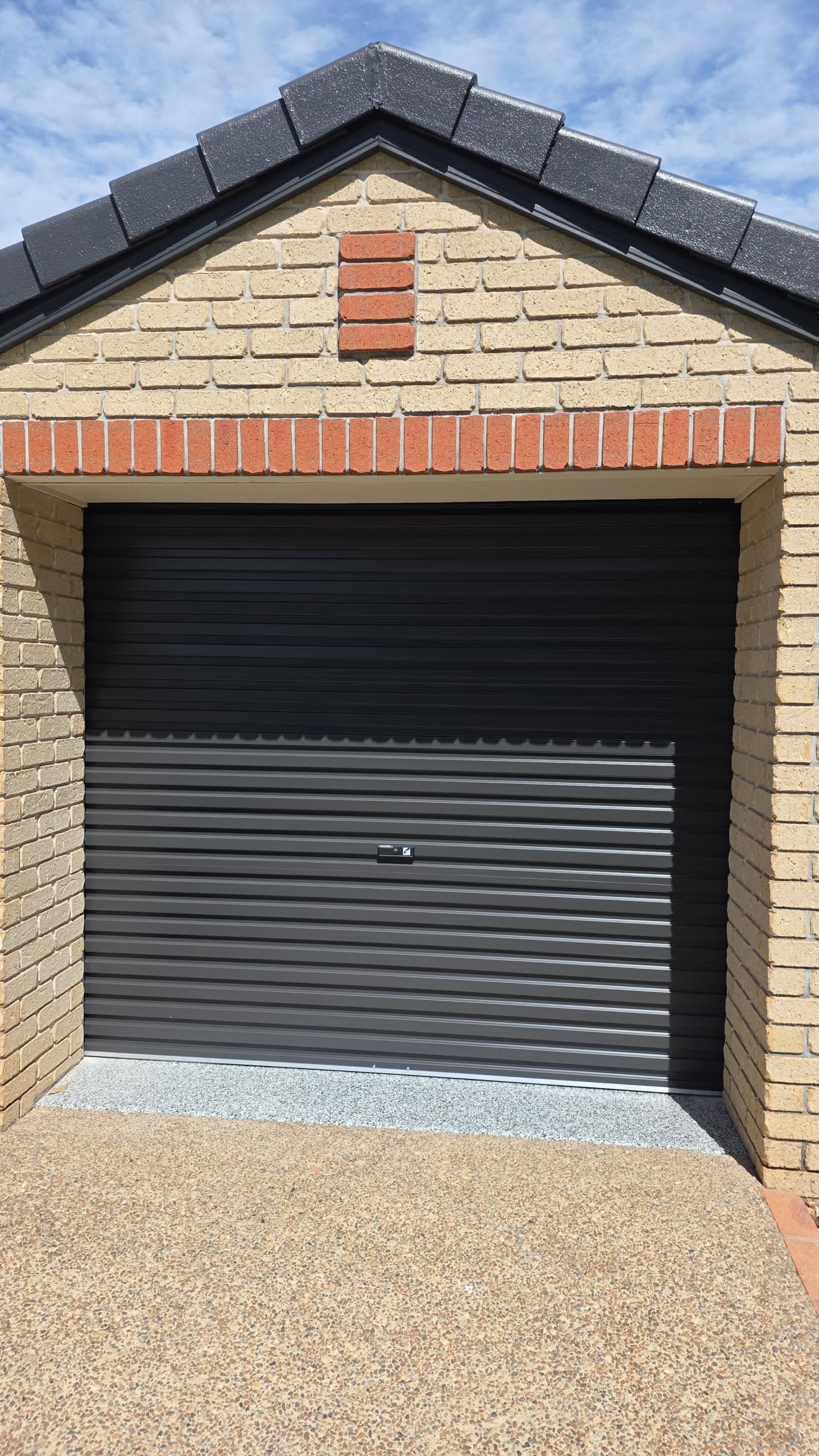 Roller garage door on a Sunshine Coast home, serviced and back in operation